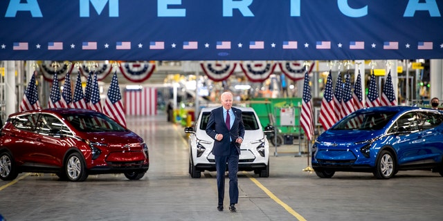 President Biden makes his entrance at General Motors' Factory ZERO electric vehicle assembly plant in Detroit, Michigan, on Nov. 21, 2021.
