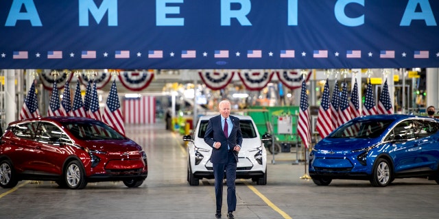 President Biden makes his entrance at General Motors' Factory ZERO electric vehicle assembly plant in Detroit, Michigan, on Nov. 21, 2021.