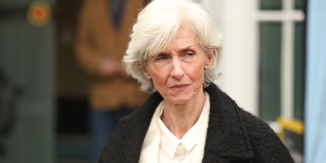 Kristin Vik, the mother of murdered Norwegian student Martine Vik Magnussen arrives to lay a wreath outside Regent's University on March 14, 2022. Her daughter's alleged killer reportedly admitted involvement.