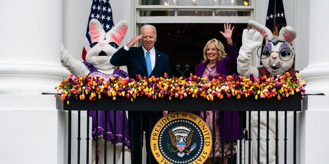 President Joe Biden, first lady Jill Biden and two Easter bunnies on the Blue Room Balcony during the White House Easter Egg Roll on the South Lawn on April 18, 2022.