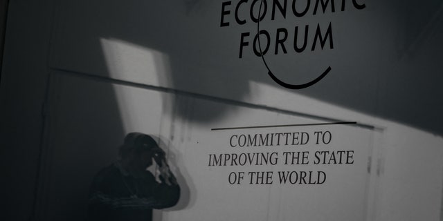 A security officer guards an entrance to a World Economic Forum event site in Davos, Switzerland, on May 21, 2022.