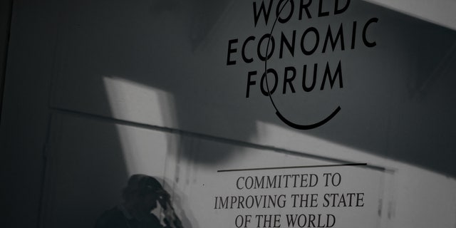 A security officer guards an entrance to a World Economic Forum event site in Davos, Switzerland, on May 21, 2022.