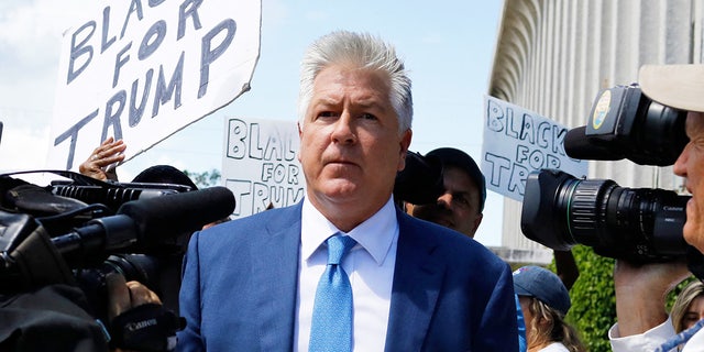 Evan Corcoran, who is a part of former President Donald Trump's legal team, leaves court after a hearing in West Palm Beach, Florida, on September 1, 2022.