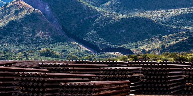 A pile of steel bollards used to build the U.S.-Mexico border wall are seen abandoned at Guadalupe Canyon, east Douglas, Arizona on September 20, 2022.