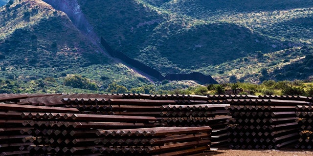 A pile of steel bollards used to build the U.S.-Mexico border wall are seen abandoned at Guadalupe Canyon, east Douglas, Arizona on September 20, 2022.