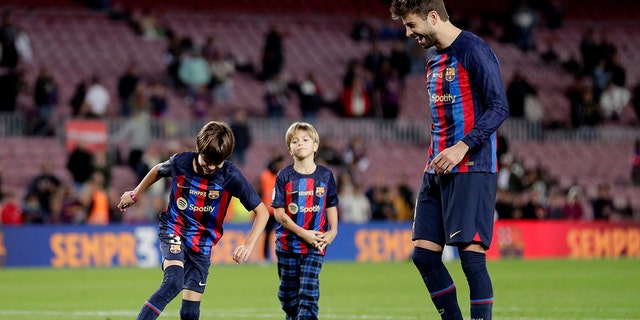 Gerard Piqué was joined by his sons Milan and Sasha on the field at an FC Barcelona-UD Almeria game, his final professional game last November.