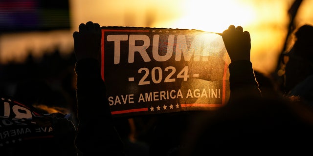 Trump supporters await his arrival at a rally for Ohio Republicans at the Dayton International Airport on November 7, 2022 in Vandalia, Ohio.