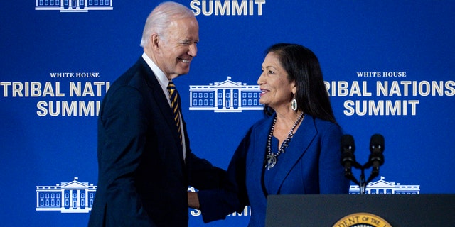 President Biden greets Interior Secretary Deb Haaland at the 2022 White House Tribal Nations Summit on Nov. 30.