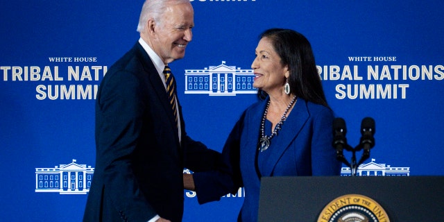 President Biden greets Interior Secretary Deb Haaland at the 2022 White House Tribal Nations Summit on Nov. 30.