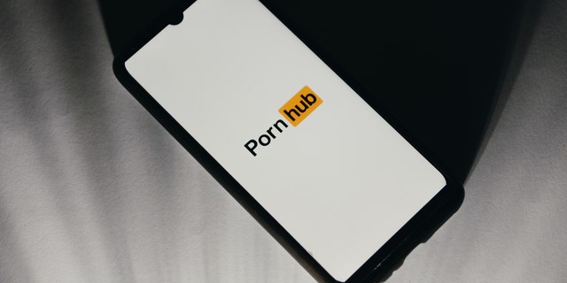 Pornhub logo on a smartphone