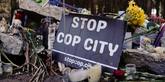 A sign is pictured near the construction site of a police training facility that activists have nicknamed "Cop City" near Atlanta on Feb. 6, 2023.