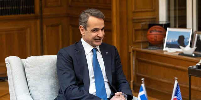 Greece's Prime Minister Kyriakos Mitsotakis is pictured at Maximos Mansion in Athens, Greece, on Feb. 20, 2023. Mitsotakis announced Friday that the country is raising its minimum wage.