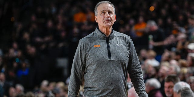 Tennessee Volunteers head coach Rick Barnes checks the clock during second half action during the basketball game between the Tennessee Volunteers and the Texas A&M Aggies at Reed Arena on February 21, 2023 in College Station, Texas.