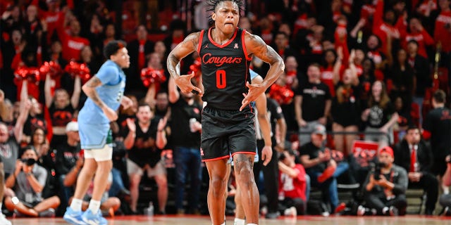 Houston Cougars guard Marcus Sasser (0) celebrates hitting a key 3-pointer during a game against the Tulane Green Wave at the Fertitta Center Feb 22, 2023, in Houston. 