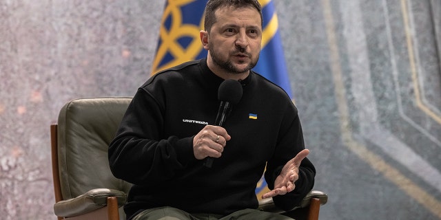 Ukrainian President Volodymyr Zelensky speaks to the media during a press conference as Ukraine marks one year since Russia's large-scale invasion, on February 24, 2023 in Kyiv, Ukraine. 