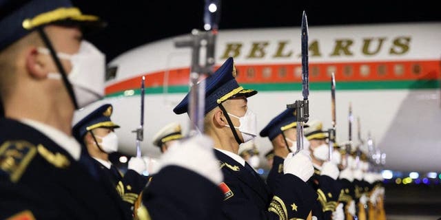 Chinese honor guards stand at attention during a welcoming ceremony for Belarusian President Alexander Lukashenko at Beijing's airport February 28, 2023.