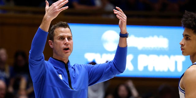 Duke Blue Devils head coach Jon Scheyer calls for his team during the first half of their game against the NC State Wolfpack at Cameron Indoor Stadium on Feb. 28, 2023 in Durham, North Carolina. 