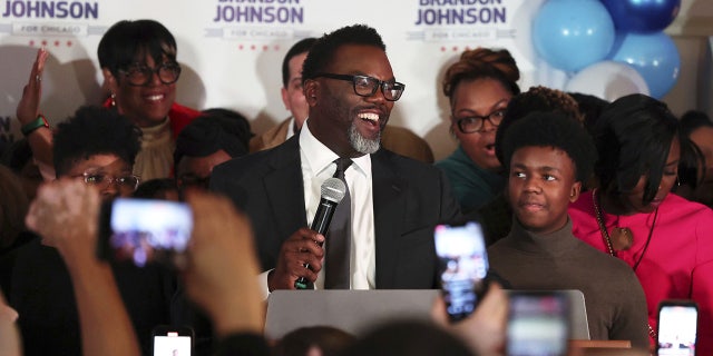 Brandon Johnson speaks with supporters after forcing a mayoral runoff election during his election night gathering on Feb. 28, 2023, in Chicago.