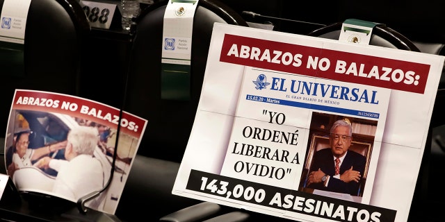 On the back of seats in Mexico's legislative chamber, banners with Andres Manuel Lopez Obrador's face note hundreds of thousands of murders in the country. Mexico saw thousands demonstrate against electoral reforms last weekend.