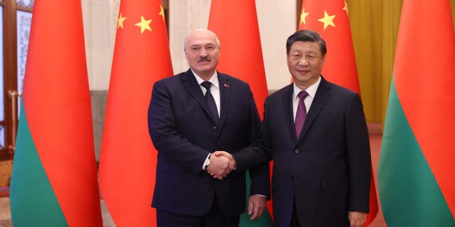 Belarusian President Alexander Lukashenko, left, meets with Chinese President Xi Jinping in Beijing March 1, 2023.