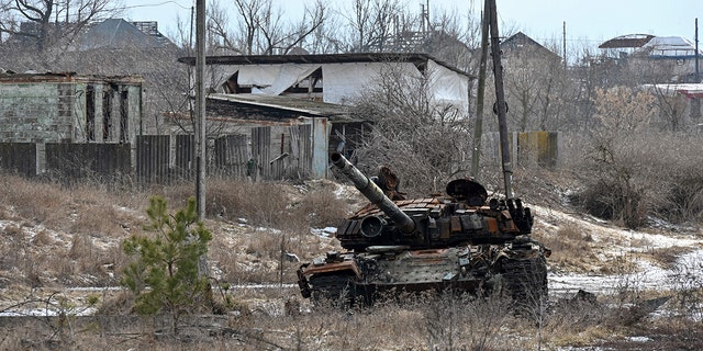 A destroyed tank is photographed in the village of Tsupivka, Kharkiv region, March 1, 2023, during the Russian invasion of Ukraine. 