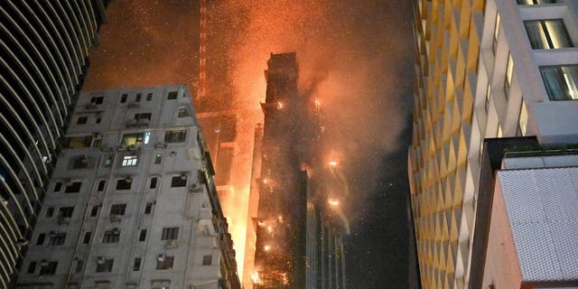 A fire breaks out in a building in Tsim Sha Tsui, in Hong Kong on early March 3, 2023. 