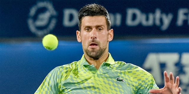 Novak Djokovic of Serbia competes with Hubert Hurkacz of Poland (not seen) during men's single quarter-final match of Dubai Duty Free Tennis Championship in Dubai, United Arab Emirates on March 02, 2023. 