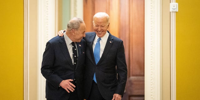 WASHINGTON, DC - MARCH 02: President Joe Biden walks with Senate Majority Leader Chuck Schumer (D-NY) as he arrives at the U.S. Capitol on Thursday, March 2, 2023 in Washington, DC. The President is attending a closed-door Senate Democratic policy luncheon on Capitol Hill (Kent Nishimura / Los Angeles Times via Getty Images)