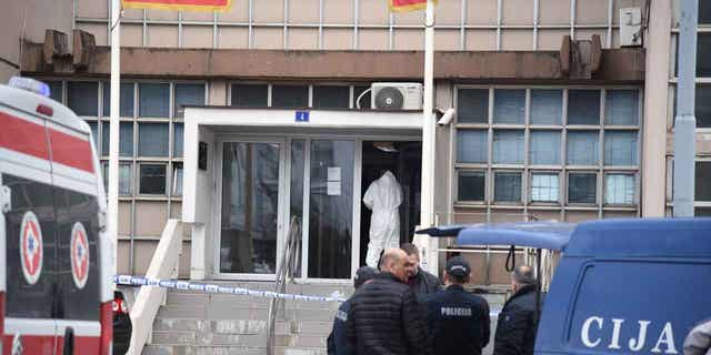 Police arrive at the scene after a local courthouse was attacked with a grenade in Podgorica, Montenegro on March 3, 2023.