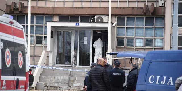 Police arrive at the scene after a local courthouse was attacked with a grenade in Podgorica, Montenegro on March 3, 2023.