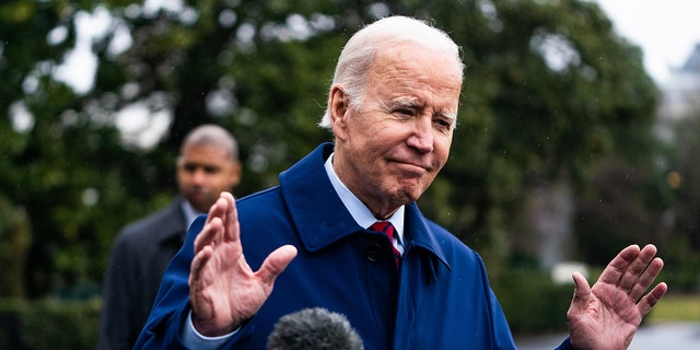 Biden goes to speak with the press during his walk to Marine One on the South Lawn of the White House on Friday, March 3, 2023.