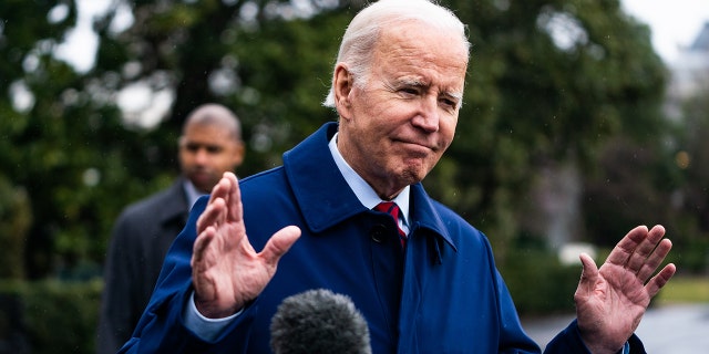 President Biden goes to speak with the press during his walk to Marine One on the South Lawn of the White House on Friday, March 3, 2023. 