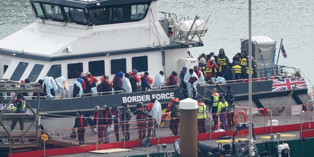 A group of people thought to be migrants are brought in to Dover, Kent, onboard a Border Force vessel following a small boat incident in the English Channel. Picture date: Monday, March 6, 2023.