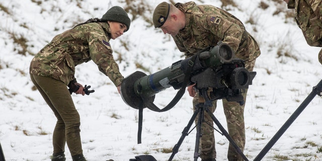 Kate Middleton took a hands-on approach during demonstrations in rural England during the snowy weather.