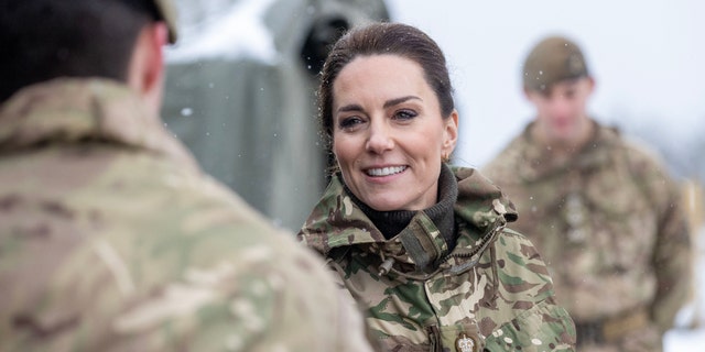 Catherine, Princess of Wales, meets personnel on an exercise during her visit with the Irish Guards March 8, 2023, in Salisbury, England. 