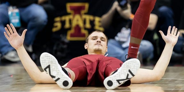 Iowa State guard Eli King reacts to being knocked to the floor during the Big 12 Tournament game between the Baylor Bears and the Iowa State Cyclones at the T-Mobile Center in Kansas City, Mo., on Thursday.