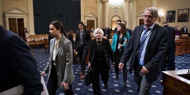 Janet Yellen, U.S. treasury secretary, center, departs following a House Ways and Means Committee hearing in Washington, D.C., Friday, March 10, 2023.