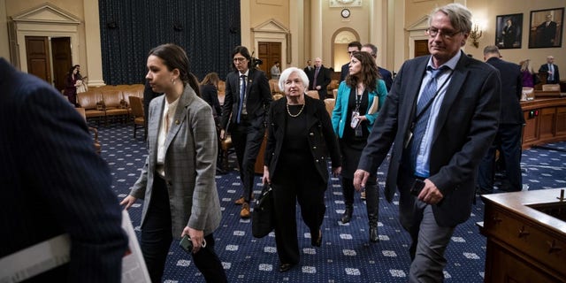 Janet Yellen, US treasury secretary, center, departs following a House Ways and Means Committee hearing in Washington, DC, Friday, March 10, 2023.