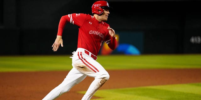 Freddie Freeman #5 of Team Canada scores a run in the third inning during Game 3 of Pool C between Team Great Britain and Team Canada at Chase Field on Sunday March 12, 2023 in Phoenix, Arizona. 