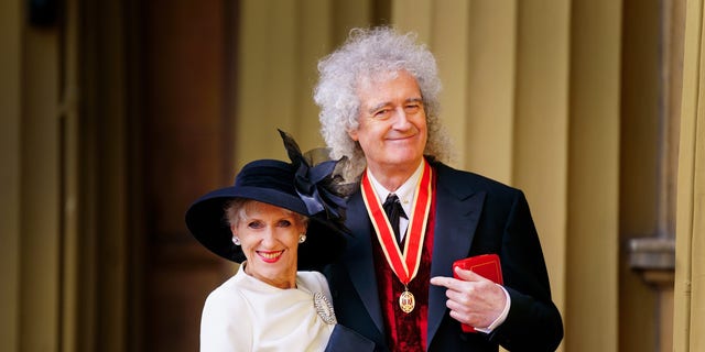 Brian May was joined by his wife Anita Dobson after being made a Knight Bachelor for services to music and charity by King Charles III.