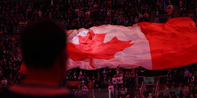The Canadian national anthem is played before the Edmonton Oilers take on the Maple Leafs on March 11, 2023 at Scotiabank Arena in Toronto.