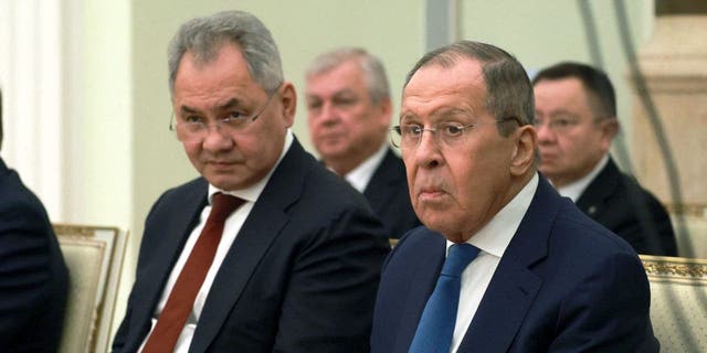 Russian Defence Minister Sergei Shoigu, left, and Foreign Minister Sergei Lavrov attend a meeting of Russia's President Vladimir Putin with his Syrian counterpart Bashar al-Assad at the Kremlin in Moscow on March 15, 2023. 
