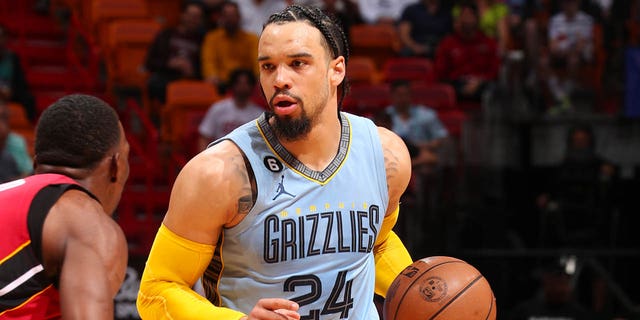 Dillon Brooks (24) of the Memphis Grizzlies dribbles the ball during a game against the Miami Heat on March 15, 2023 at Miami-Dade Arena in Miami, Florida. 