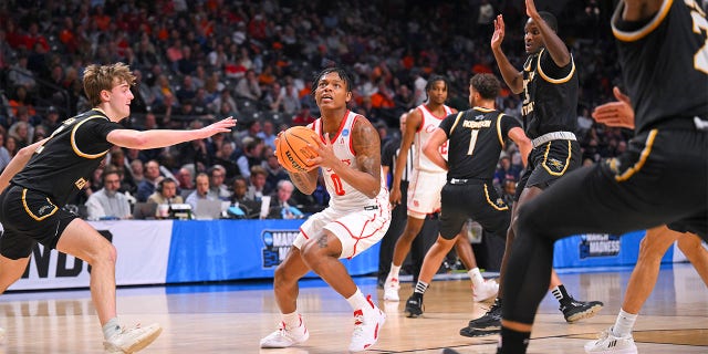 Marcus Sasser (0) of the Houston Cougars looks to shoot in the first half during the first round of the 2023 NCAA Tournament at Legacy Arena at the BJCC March 16, 2023, in Birmingham, Ala. 