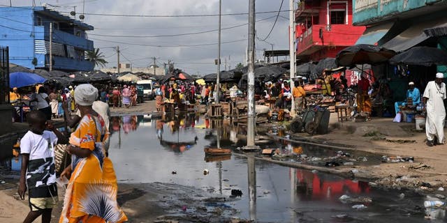 Polluted water near a market in Abobo, a suburb of Abidjan, in the Ivory Coast, on March 17, 2023.