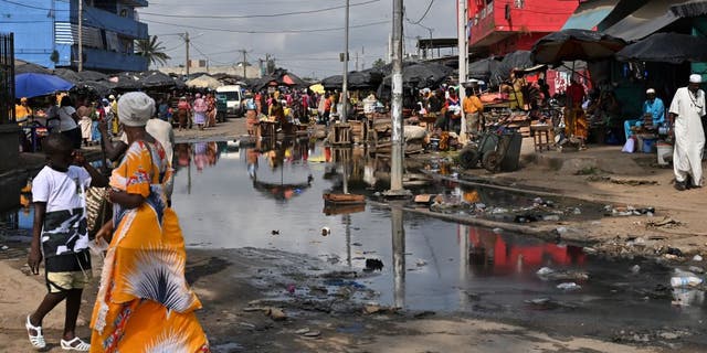 Polluted water near a market in Abobo, a suburb of Abidjan, in the Ivory Coast, on March 17, 2023.