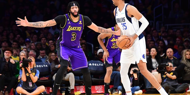 Anthony Davis (3) of the Los Angeles Lakers defends during a game against the Dallas Mavericks on March 17, 2023 at Crypto.Com Arena in Los Angeles.