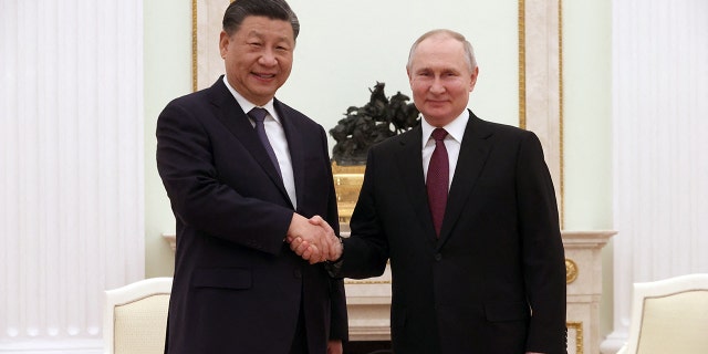 Russian President Vladimir Putin, right, meets with China's President Xi Jinping at the Kremlin in Moscow on March 20, 2023.