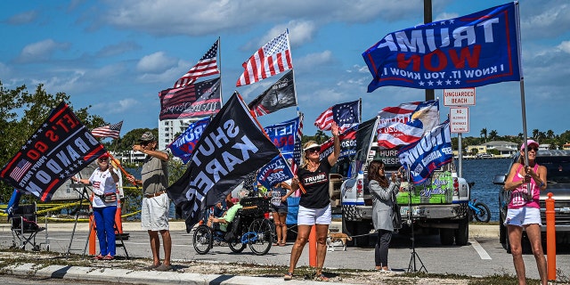 Supporters of former US President Donald Trump protest near Mar-a-Lago Club in Palm Beach, Florida, on March 21, 2023.