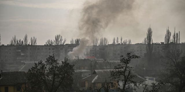 This photograph taken on March 22, 2023 shows smoke rising over the town of Chasiv Yar, near Bakhmut, after a Russian shelling.